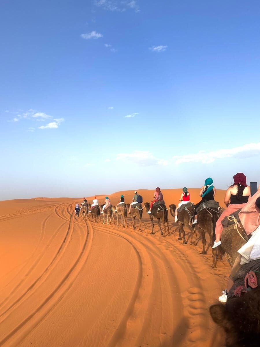 Photo by Noor din “Marrakech to Sahara desert tour camel ride”
