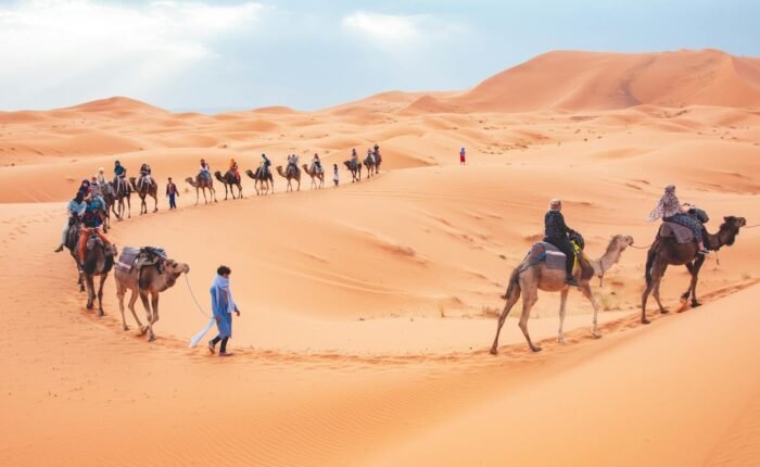 camel trek Morocco Sahara desert Merzouga dunes