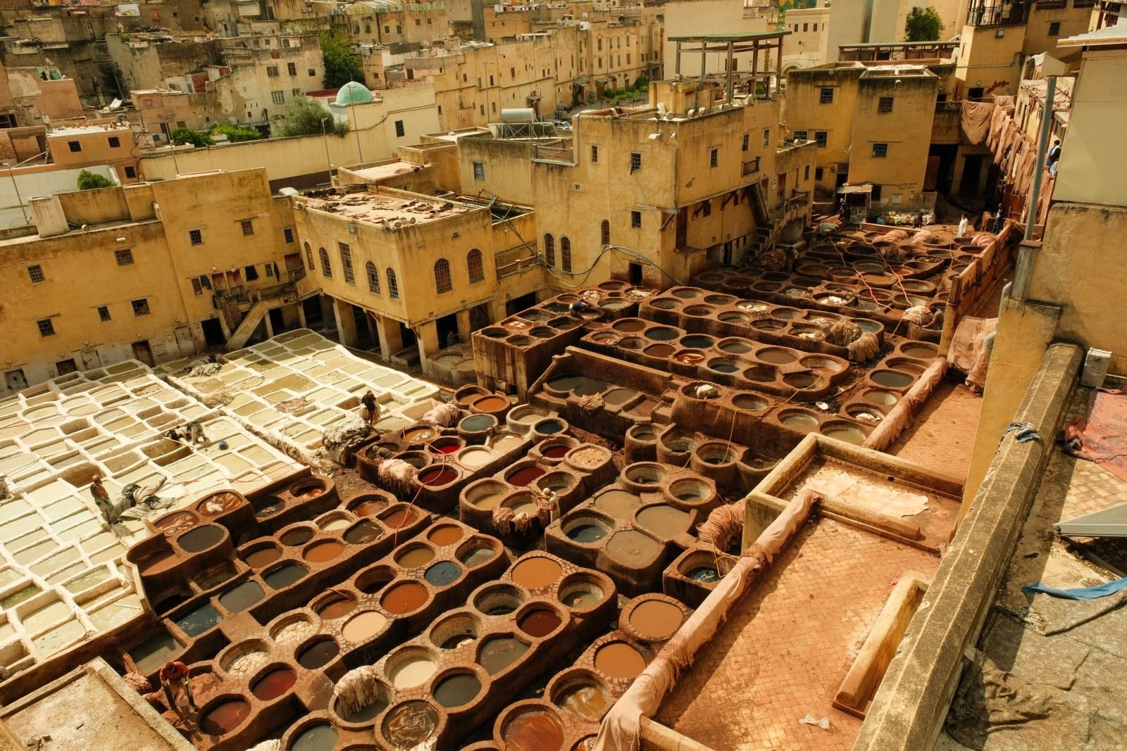Historic Chouara Tannery in Fes, Morocco, showcasing traditional leather dyeing vats. Morocco Holidays From Manchester | Private Tours & Packages